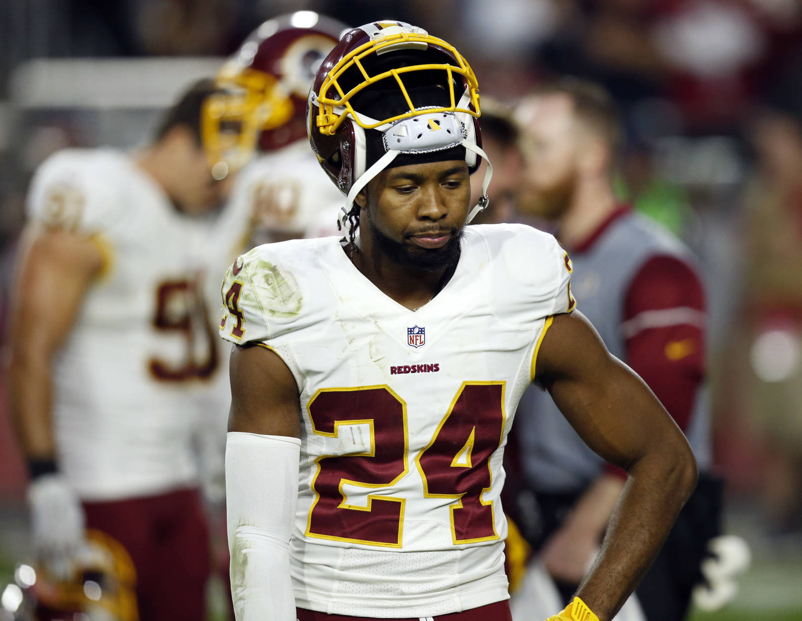 Washington Redskins cornerback Josh Norman (24) looks down as time expires during the second half of an NFL football game against the Arizona Cardinals, Sunday, Dec. 4, 2016, in Glendale, Ariz. The Cardinals won 31-23. (AP Photo/Ross D. Franklin)