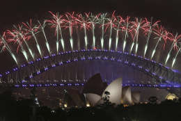 Fireworks explode over the Sydney Opera House and Harbour Bridge as New Year's celebrations are underway in Sydney, Australia, Sunday, Jan. 1, 2017. (AP Photo/Rick Rycroft)