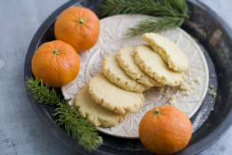 In this image taken on Monday, Nov. 5, 2012, tangerine mace shortbread cookies are shown served on a plate in Concord, N.H. (AP Photo/Matthew Mead)