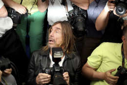Singer Iggy Pop poses for photographers during a photo call for the film Gimme Danger at the 69th international film festival, Cannes, southern France, Thursday, May 19, 2016. (AP Photo/Joel Ryan)