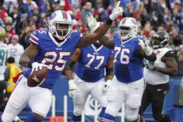 Buffalo Bills running back LeSean McCoy (25) celebrates after rushing for a touchdown during the first half of an NFL football game against the Jacksonville Jaguars on Sunday, Nov. 27, 2016, in Orchard Park, N.Y. (AP Photo/Jeffrey T. Barnes)