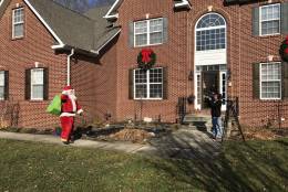 Prince George’s County Fire Chief Marc Bashoor tweeted this photo of Santa, who arrived by fire truck to visit two young victims of domestic violence on Sunday, Dec. 25, 2016. (PGFD/Marc Bashoor via Twitter)