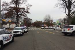 Police close a portion of Connecticut Avenue due to reports of a man with a gun. (WTOP/Dick Uliano)
