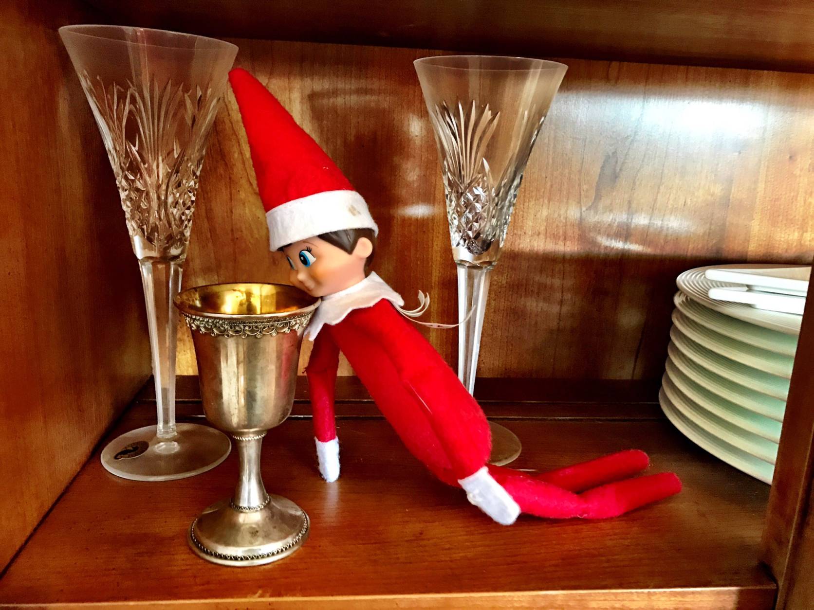 Our #elfonashelf was found sipping from the ✡️kiddish cup, says WTOP's Neal Augenstein. (WTOP/Neal Augenstein)