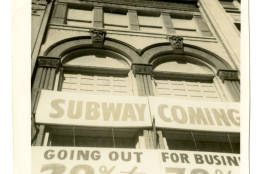 A business at 1102 G SSt. in Northwest, near what is now Metro Center, advertised its liquidation sale in relation to the coming of Metrorail. (Chris Earnshaw, courtesy National Building Museum)