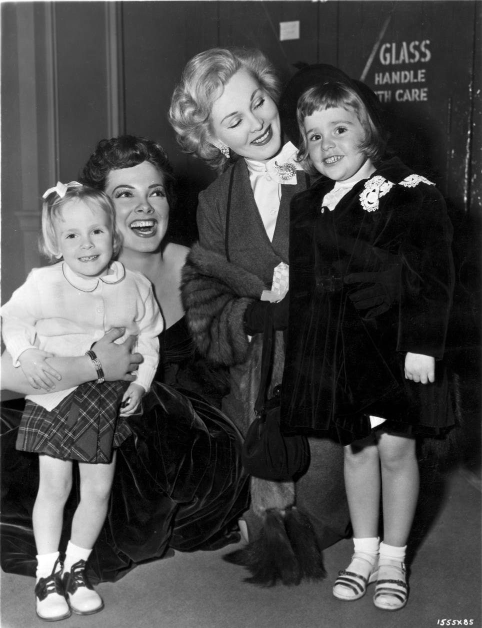 1952:  Hungarian born Zsa Zsa Gabor, the American leading lady with Kathryn Grayson and their daughters on the set of 'Lovely To Look At'.  (Photo by Hulton Archive/Getty Images)