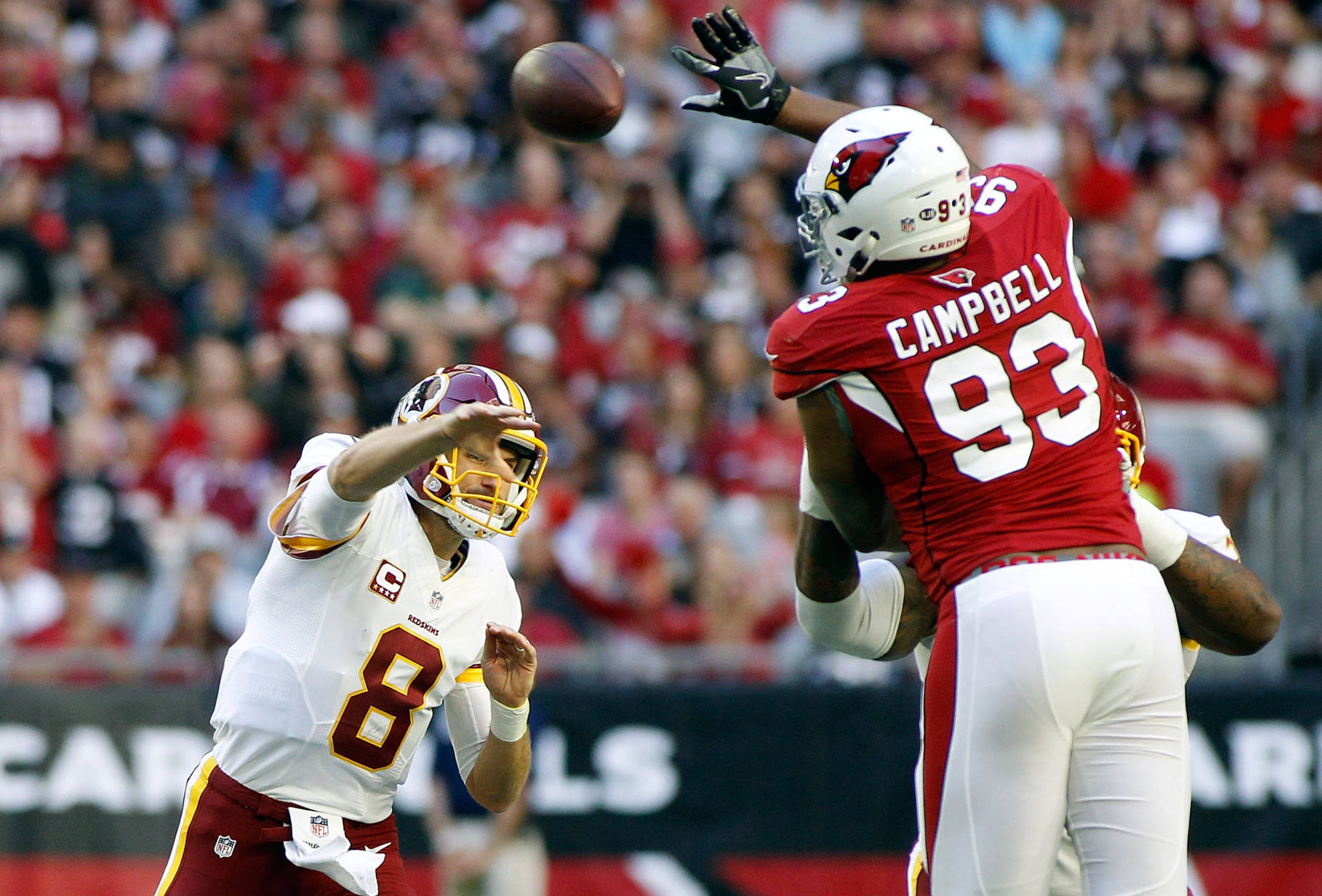 GLENDALE, AZ - DECEMBER 04:  Calais Campbell #93 of the Arizona Cardinals leaps to block the pass of quarterback Kurk Cousins #8 of the Washington Redskins during the first quarter of a game at University of Phoenix Stadium on December 4, 2016 in Glendale, Arizona.  (Photo by Ralph Freso/Getty Images)