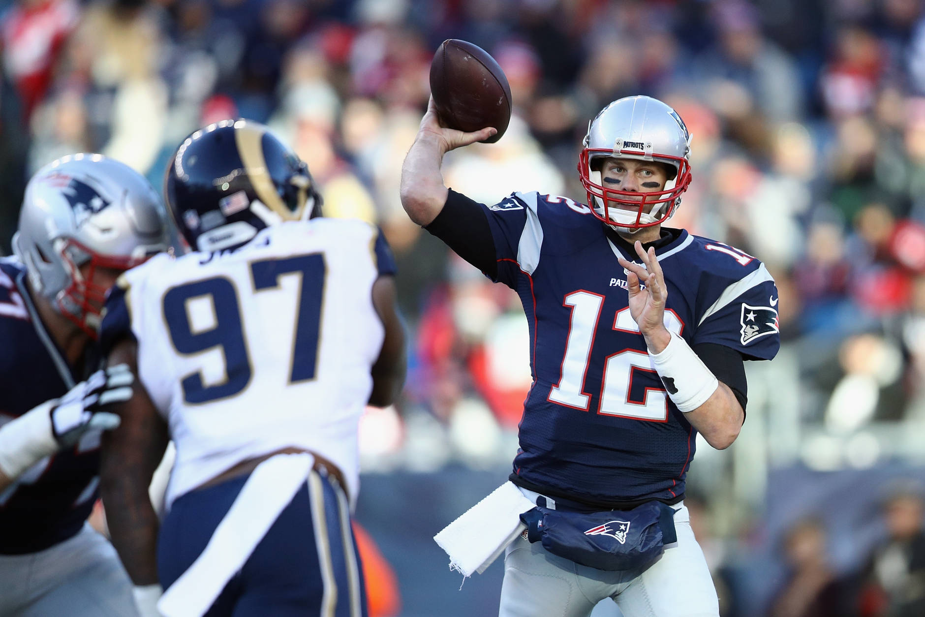 FOXBORO, MA - DECEMBER 04:  Tom Brady #12 of the New England Patriots throws a pass during the second half against the Los Angeles Rams at Gillette Stadium on December 4, 2016 in Foxboro, Massachusetts.  (Photo by Maddie Meyer/Getty Images)