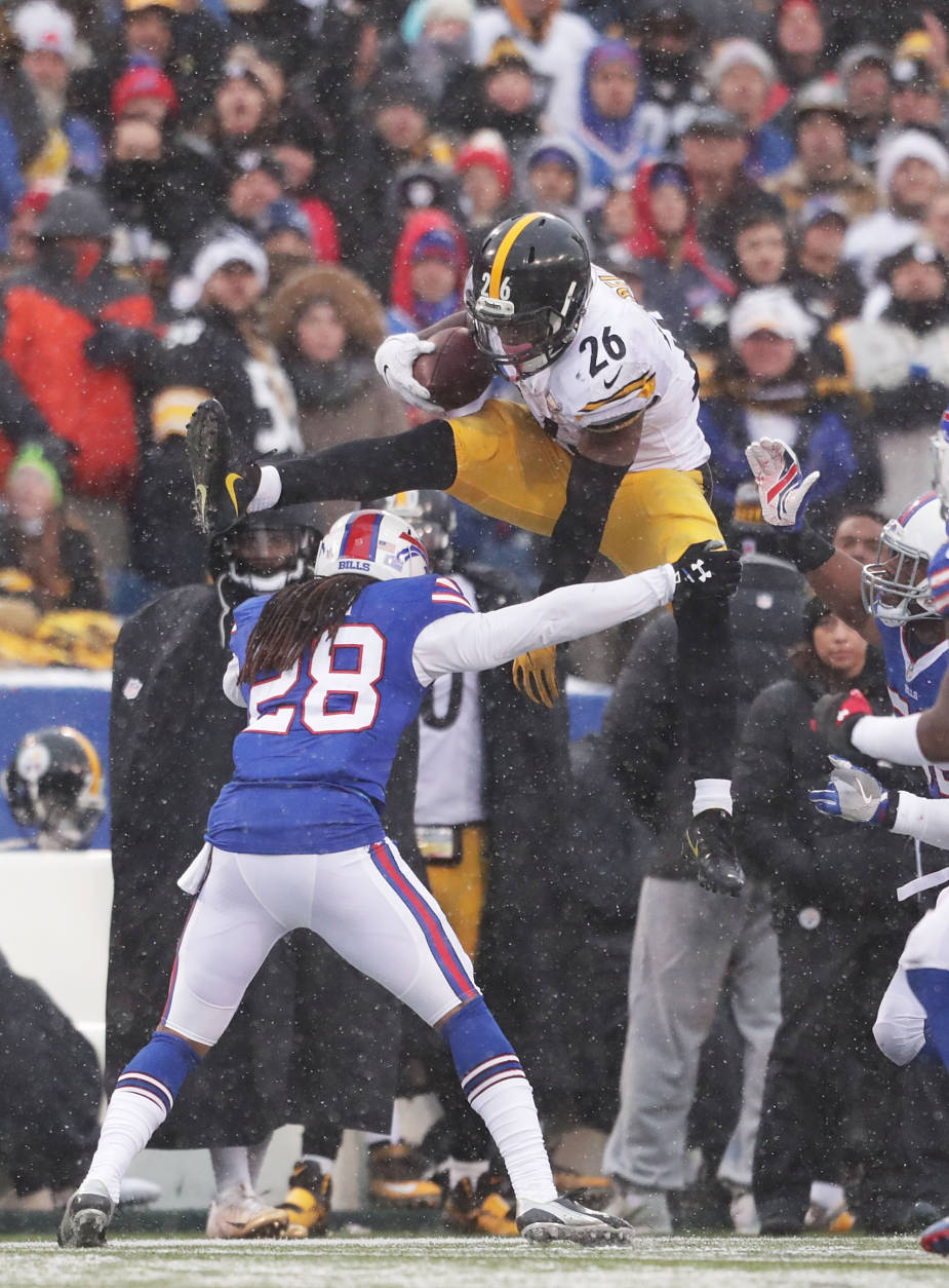 ORCHARD PARK, NY - DECEMBER 11:  Le'Veon Bell #26 of the Pittsburgh Steelers jumps over  Ronald Darby #28 of the Buffalo Bills during the second half at New Era Field on December 11, 2016 in Orchard Park, New York.  (Photo by Brett Carlsen/Getty Images)