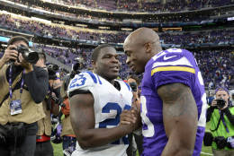 MINNEAPOLIS, MN - DECEMBER 18: Frank Gore #23 of the Indianapolis Colts and Adrian Peterson #28 of the Minnesota Vikings greet each other after the game on December 18, 2016 at US Bank Stadium in Minneapolis, Minnesota. The Colts defeated the Vikings 34-6. (Photo by Hannah Foslien/Getty Images)