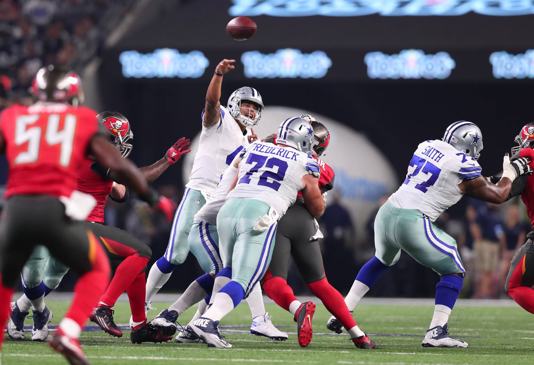 ARLINGTON, TX - DECEMBER 18:  Dak Prescott #4 of the Dallas Cowboys throws a pass during the second quarter against the Tampa Bay Buccaneers at AT&amp;T Stadium on December 18, 2016 in Arlington, Texas. (Photo by Tom Pennington/Getty Images)