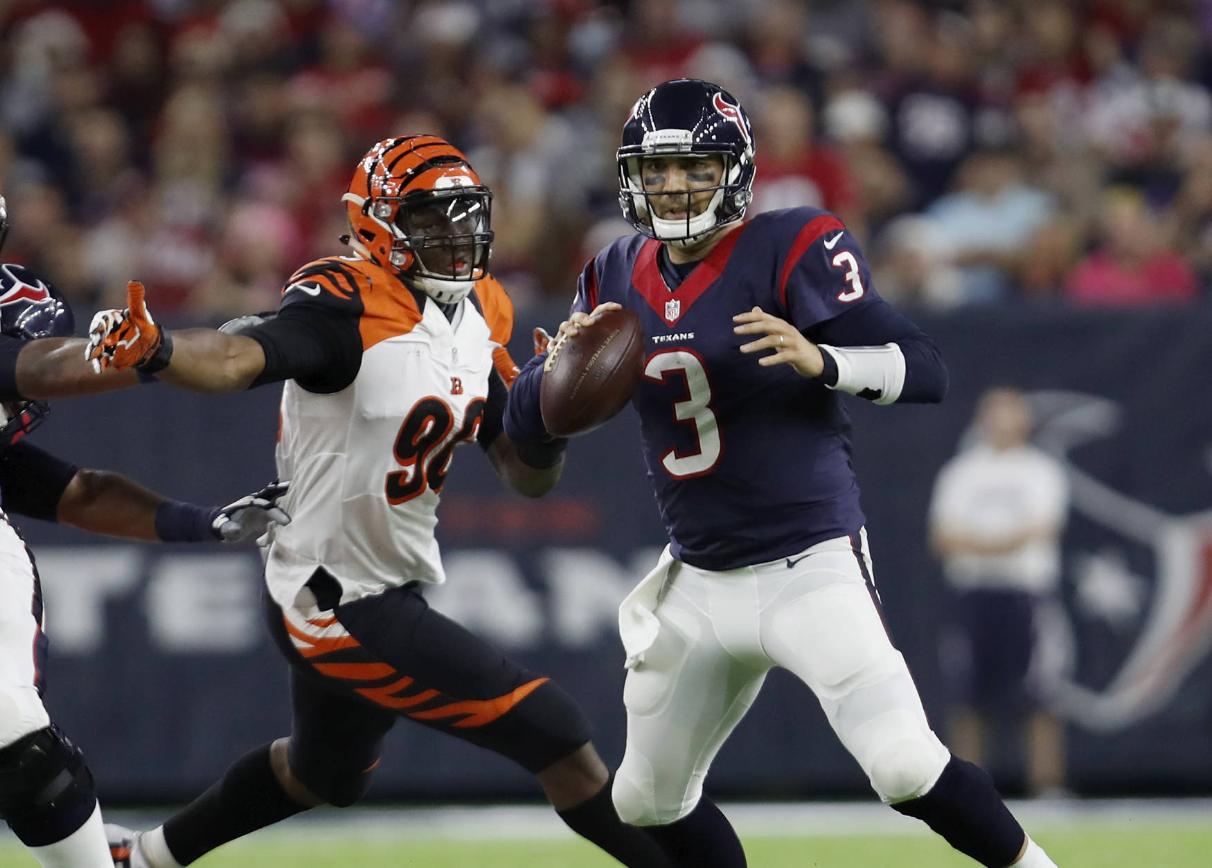 HOUSTON, TX - DECEMBER 24:  Carlos Dunlap #96 of the Cincinnati Bengals pressures Tom Savage #3 of the Houston Texans in the third quarter at NRG Stadium on December 24, 2016 in Houston, Texas.  (Photo by Tim Warner/Getty Images)