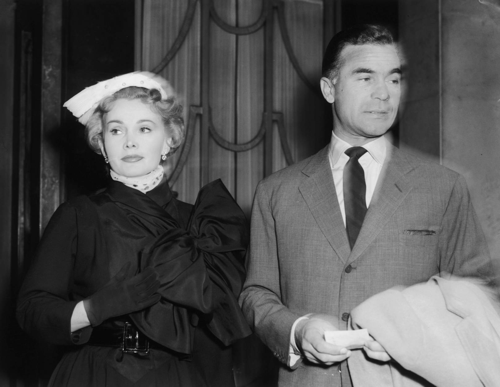 Hungarian actress Zsa Zsa Gabor with Dominican diplomat and playboy Porfirio Rubirosa (1909 - 1965) at Claridges Hotel in London, 29th April 1954. (Photo by Terry Fincher/Keystone/Hulton Archive/Getty Images)