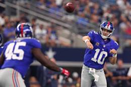 ARLINGTON, TX - SEPTEMBER 11:  Eli Manning #10 of the New York Giants throws a pass during the second half against the Dallas Cowboys at AT&amp;T Stadium on September 11, 2016 in Arlington, Texas.  (Photo by Tom Pennington/Getty Images)