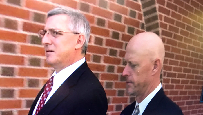 John Miller IV (right, with attorney Steven Fleming) was released on bond in November. (File photo, WTOP/Neal Augenstein)