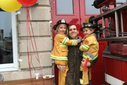 Community members brought their children to enjoy the festivities--some dressed up like firefighters.(WTOP/Liz Anderson)