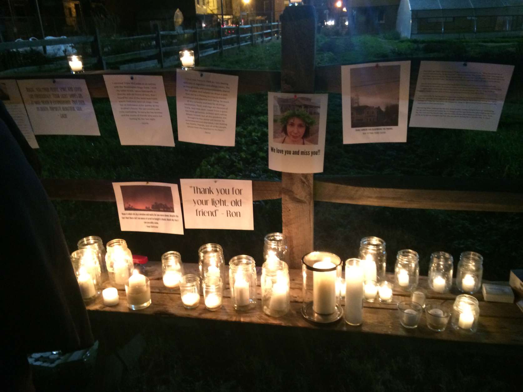 Supporters and mourners create a candlelit memorial for Tricia McCauley. (WTOP/Dick Uliano)