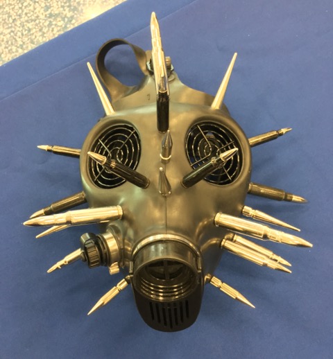 Post-apocalyptic bullet adorned gas mask — Miami International Airport (MIA)