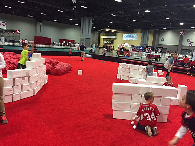 Kids play with 'ice' blocks during the Washington Nationals 2016 Winterfest on Saturday, Dec. 10, 2016. (WTOP/John Domen)