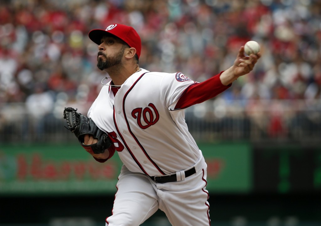 Washington Nationals relief pitcher Oliver Perez (46) throws an interleague baseball game against the Minnesota Twins at Nationals Park, Saturday, April 23, 2016, in Washington. The Nationals won 2-0. (AP Photo/Alex Brandon)