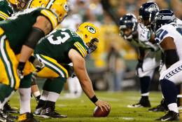 GREEN BAY, WI - SEPTEMBER 20:  Center Corey Linsley #63 of the Green Bay Packers prepares to snap the football against the Seattle Seahawks during the NFL game at Lambeau Field on September 20, 2015 in Green Bay, Wisconsin.  (Photo by Christian Petersen/Getty Images)