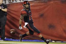 San Diego State running back Donnel Pumphrey scores a touchdown during the first half of an NCAA college football game against San Jose State Friday, Oct. 21, 2016, in San Diego. (AP Photo/Gregory Bull)