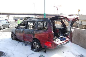 Virginia State Police say a woman's vehicle caught fire, shown here, after a police pursuit that began in Fairfax County, Virginia and ended in Alexandria on Saturday, Dec. 31, 2016. (Courtesy Virginia State Police)
