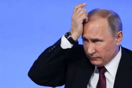 During a news conference in December, Russian President Vladimir Putin mocked allegations of hacking, saying that Democrats are "looking elsewhere for things to blame." (AP Photo/Pavel Golovkin)