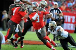 TAMPA, FL - DECEMBER 13: Quarterback Jameis Winston #3 of the Tampa Bay Buccaneers scrambles for a big gain in the second quarter against the New Orleans Saints at Raymond James Stadium on December 13, 2015 in Tampa, Florida. (Photo by Cliff McBride/Getty Images)