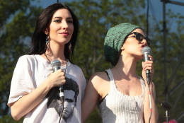 Jessica Origliasso, left, and Lisa Origliasso of the band The Veronicas perform in concert at Rockford Park on Friday, May 8, 2015, in Wilmington, Del. (Photo by Owen Sweeney/Invision/AP)