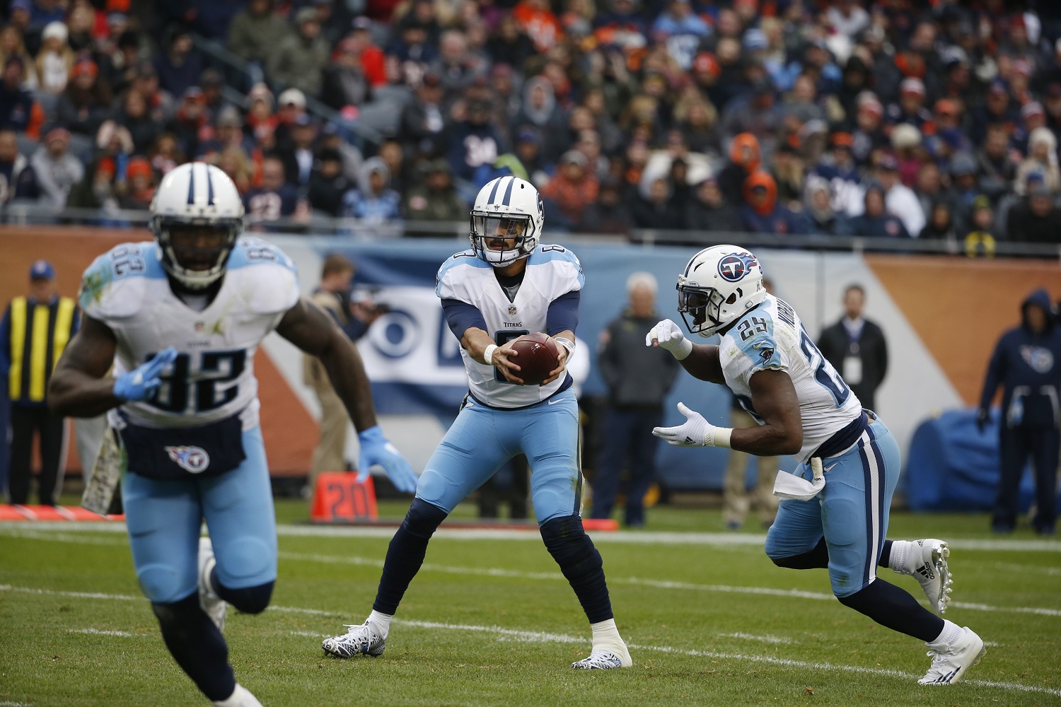 Tennessee Titans quarterback Marcus Mariota (8) hands off the ball to running back DeMarco Murray (29) during the first half of an NFL football game against the Chicago Bears, Sunday, Nov. 27, 2016, in Chicago. (AP Photo/Nam Y. Huh)