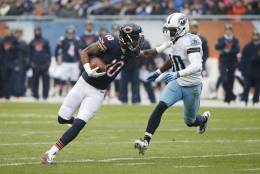 Chicago Bears wide receiver Marquess Wilson (10) runs against Tennessee Titans cornerback Jason McCourty (30) during the first half of an NFL football game, Sunday, Nov. 27, 2016, in Chicago. (AP Photo/Charles Rex Arbogast)