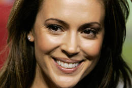 ** FILE ** In this Thursday, Oct. 11, 2007 file photo, actress Alyssa Milano is pictured in Phoenix. Milano has asked for a court's protection from a man she says hiked miles to try to her reach her home and has repeatedly tried to meet her. (AP Photo/Ross D. Franklin)