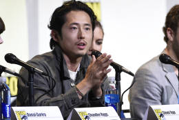 Steven Yeun speaks during the "The Walking Dead" panel on day 2 of Comic-Con International on Friday, July 22, 2016, in San Diego. (Photo by Chris Pizzello/Invision/AP)