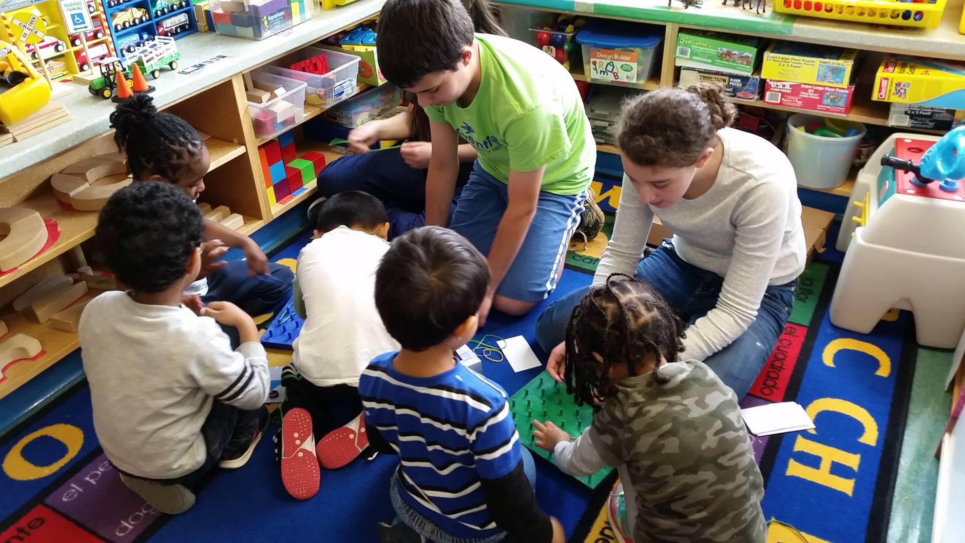 Inventions Academy students partnered with the Northern Virginia Family Service (NVFS) Head Start Preschool in Arlington and engineered STEM toys for disadvantaged preschoolers to teach them about Science, Engineering and Math.  (Courtesy Juliana Heitz)