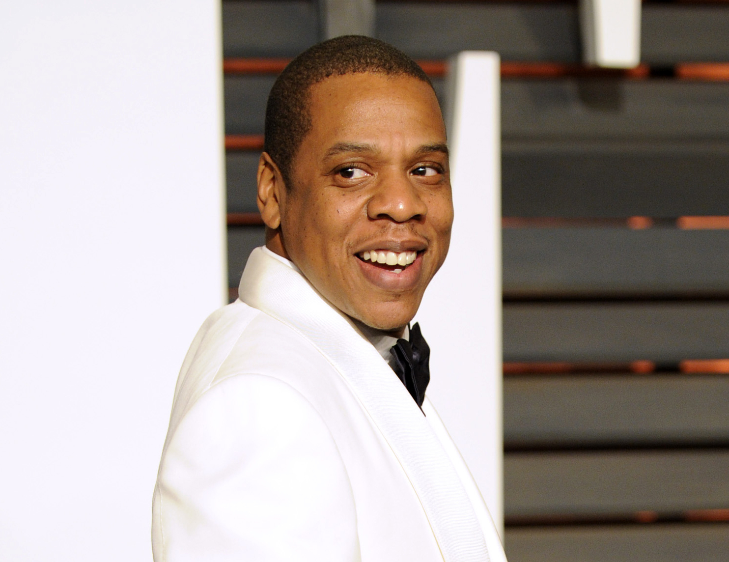 FILE - In this Feb. 22, 2015 file photo, Jay Z arrives at the 2015 Vanity Fair Oscar Party in Beverly Hills, Calif.  Jay Z, one of contemporary music’s most celebrated lyricists and entertainers, is one of the nominees for the 2017 Songwriters Hall of Fame, and if inducted he could become the first rapper to enter the prestigious music organization. The Songwriters Hall gave The Associated Press the list of nominees Thursday, Oct. 20, 2016 a day ahead of its official announcement. (Photo by Evan Agostini/Invision/AP, File)