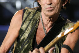 Keith Richards performs during a concert of the Rolling Stones "A Bigger Bang" European Tour, in Bucharest, Romania, Tuesday July 17, 2007. (AP Photo/Vadim Ghirda)