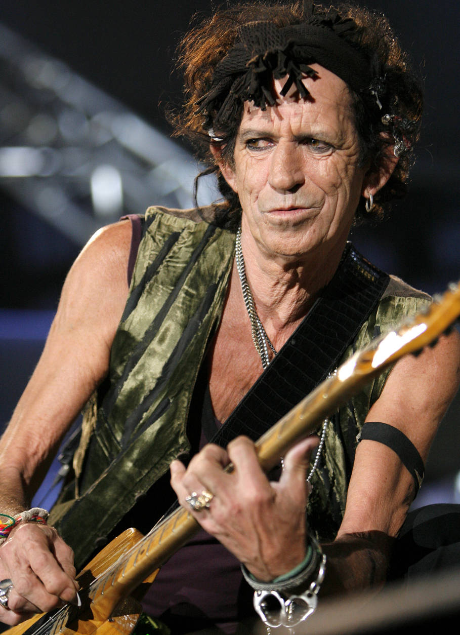 Keith Richards performs during a concert of the Rolling Stones "A Bigger Bang" European Tour, in Bucharest, Romania, Tuesday July 17, 2007. (AP Photo/Vadim Ghirda)