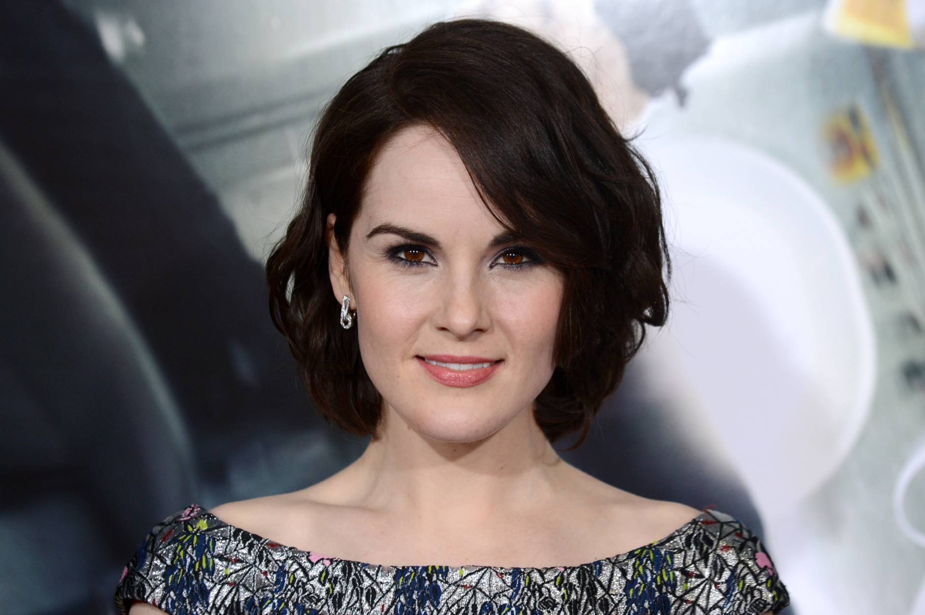 Michelle Dockery arrives at the Los Angeles premiere of "Non-Stop" at the Westwood Regency Village Theater on Monday, Feb. 24, 2014. (Photo by Jordan Strauss/Invision/AP)