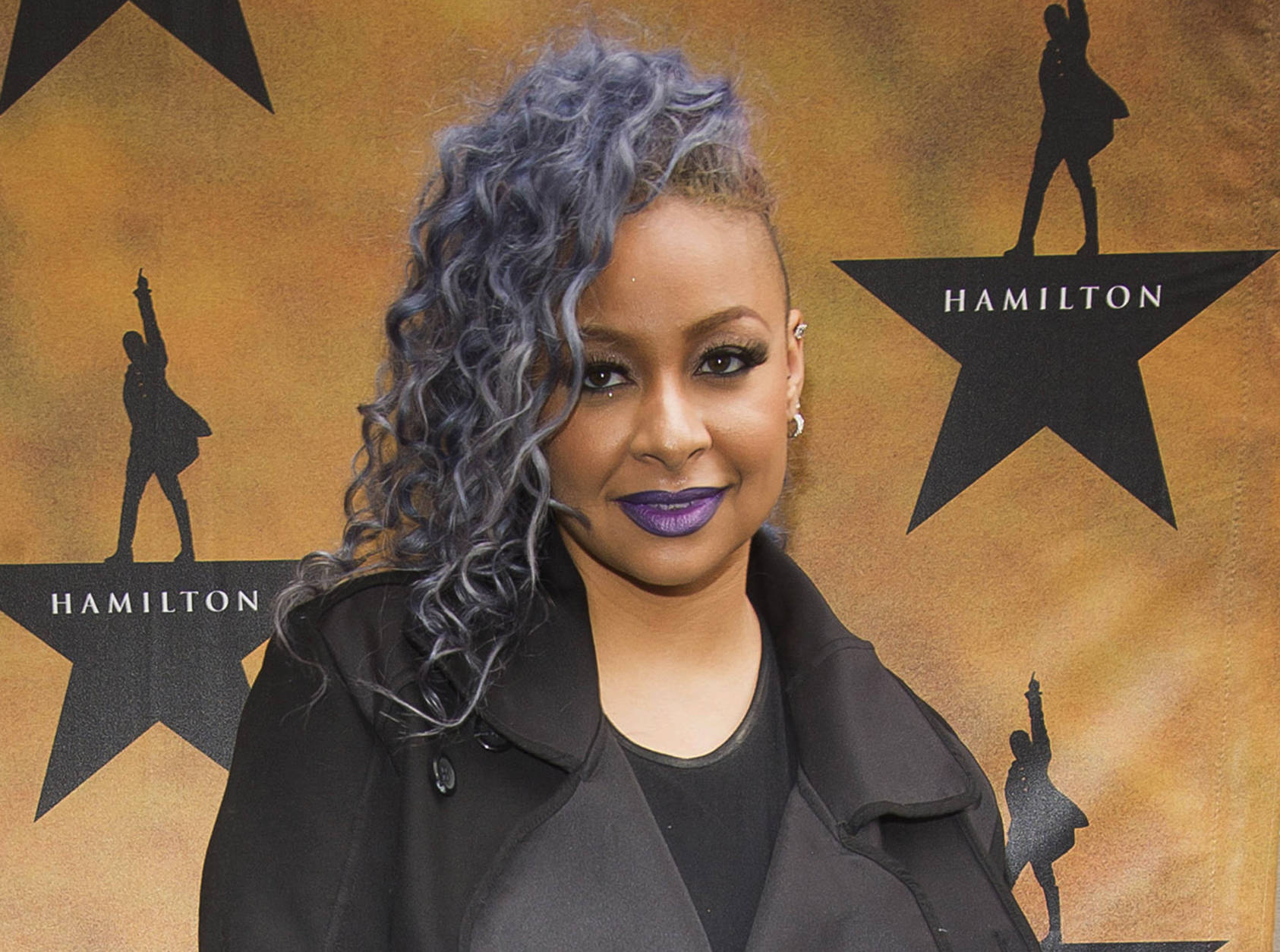 FILE - In this Aug. 6, 2015, file photo, Raven-Symone attends the Broadway opening night of "Hamilton" at the Richard Rodgers Theatre in New York. Actress Raven-Symone is the latest host to leave the daytime chatfest "The View." She announced on the show Thursday, Oct. 27, 2016, that she'll be gone before the end of the year. She's producing and starring in a remake of the sitcom "That's So Raven" for The Disney Channel, where she said her character will now be a single mom of two children, one of whom has "visions." (Photo by Charles Sykes/Invision/AP, File)