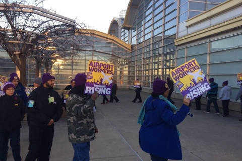 Hundreds of workers go on strike at Reagan National and Dulles