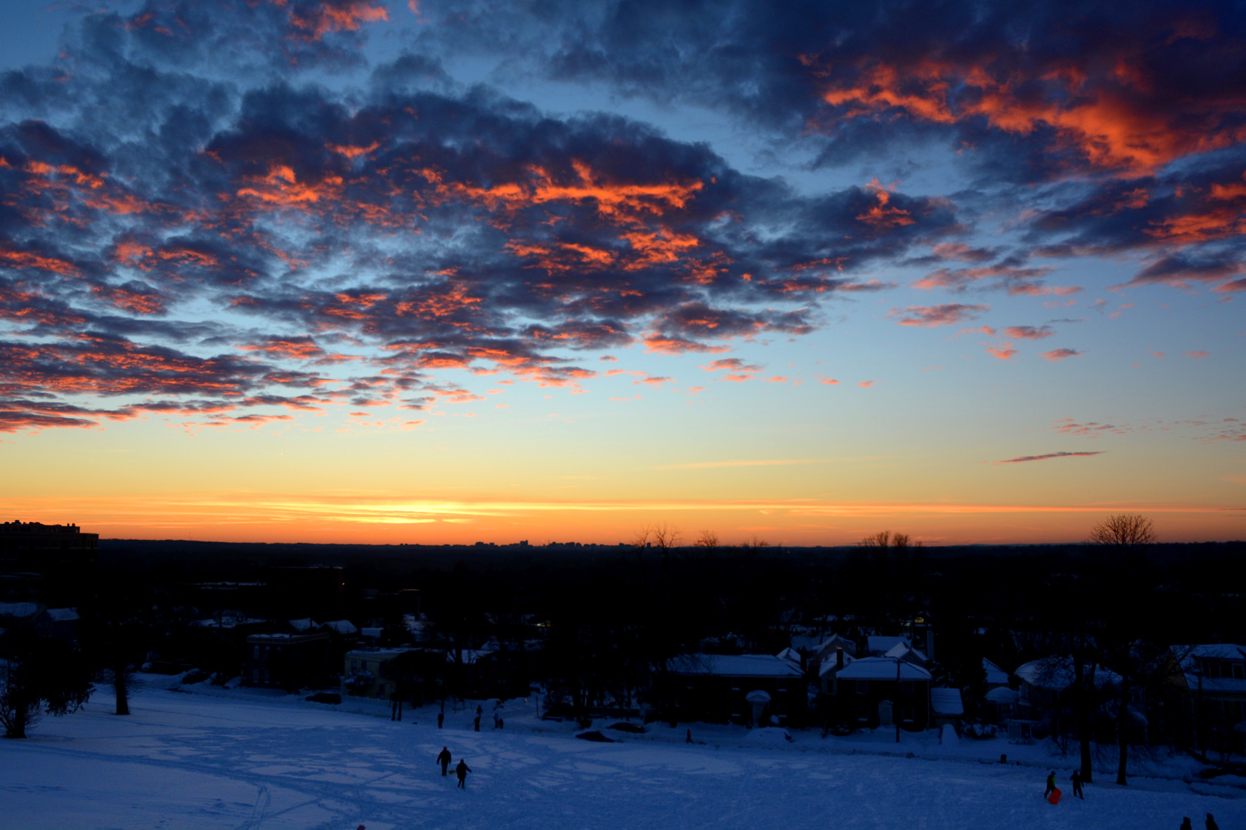 The first sunset following the Blizzard of 2016 was highlighted by patches of auto-cumulus clouds. What made this sunset more unique, however, was the lack of contrails. Most flights at Dulles International and Reagan National airports remained grounded through the end of the weekend. (WTOP/Dave Dildine)