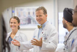 Dr. Allen Taylor, cardiologist, is pictured doing rounds with hospital fellows and residents. (Photo courtsey, MedStar Washington Hospital Center)