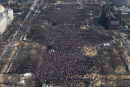 Crowds gather along the National Mall during the swearing-in ceremony of President-elect Barack Obama, Tuesday, Jan, 20, 2009, in Washington. (AP Photo/Luis M. Alvarez)