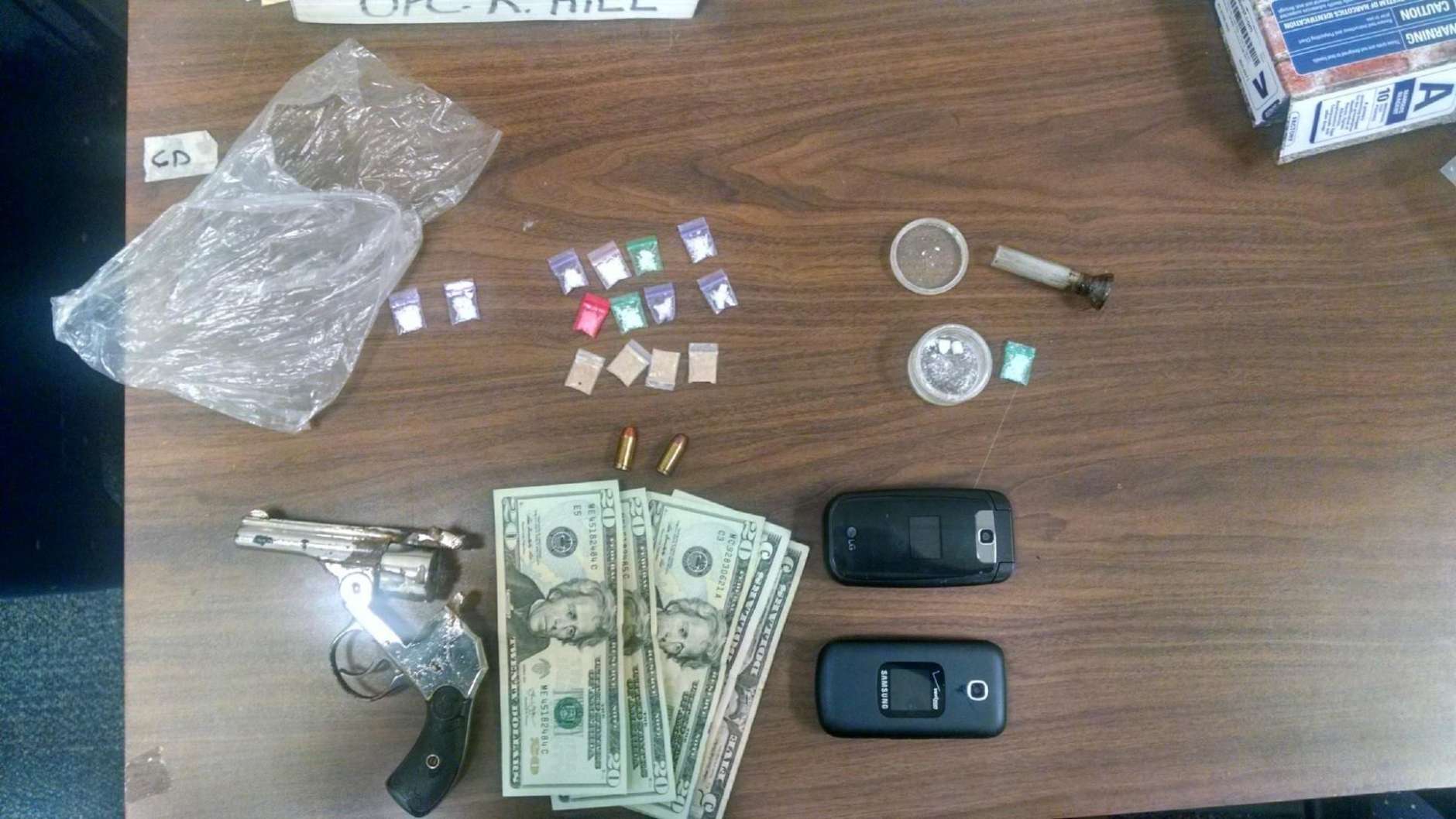 More than 3 grams of crack cocaine, nearly 1 gram of heroin, and a loaded revolver handgun was seized during a February 2015 traffic stop in Glen Burnie. Anne Arundel County Police arrested the two suspects. (Photo courtesy Anne Arundel County police)