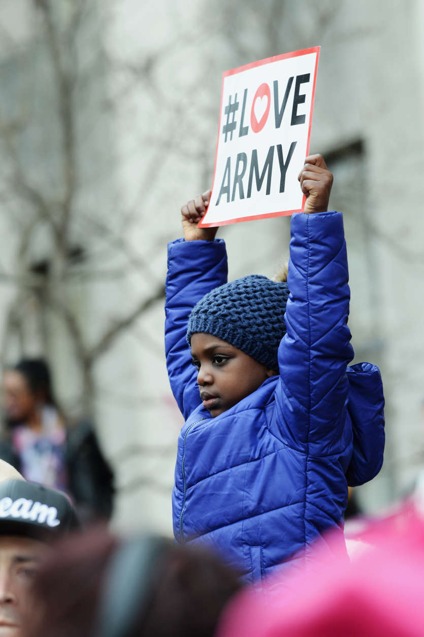 A young protester holds up a sign during the Women's March on Washington on Jan. 21, 2017. (Courtesy Shannon Finney)