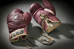 Muhammad Ali’s training boxing gloves  (Photo by Eric Long, Smithsonian National Museum of African American History & Culture)