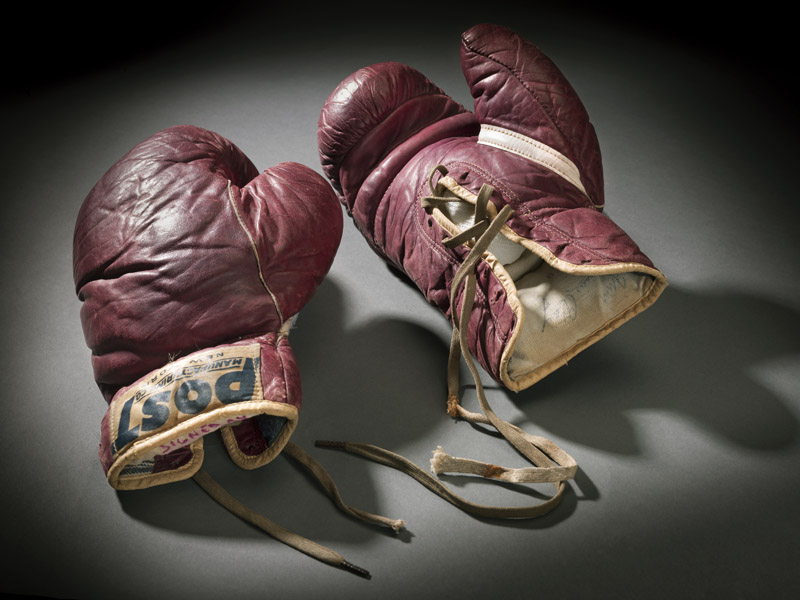 Muhammad Ali’s training boxing gloves  (Photo by Eric Long, Smithsonian National Museum of African American History & Culture)