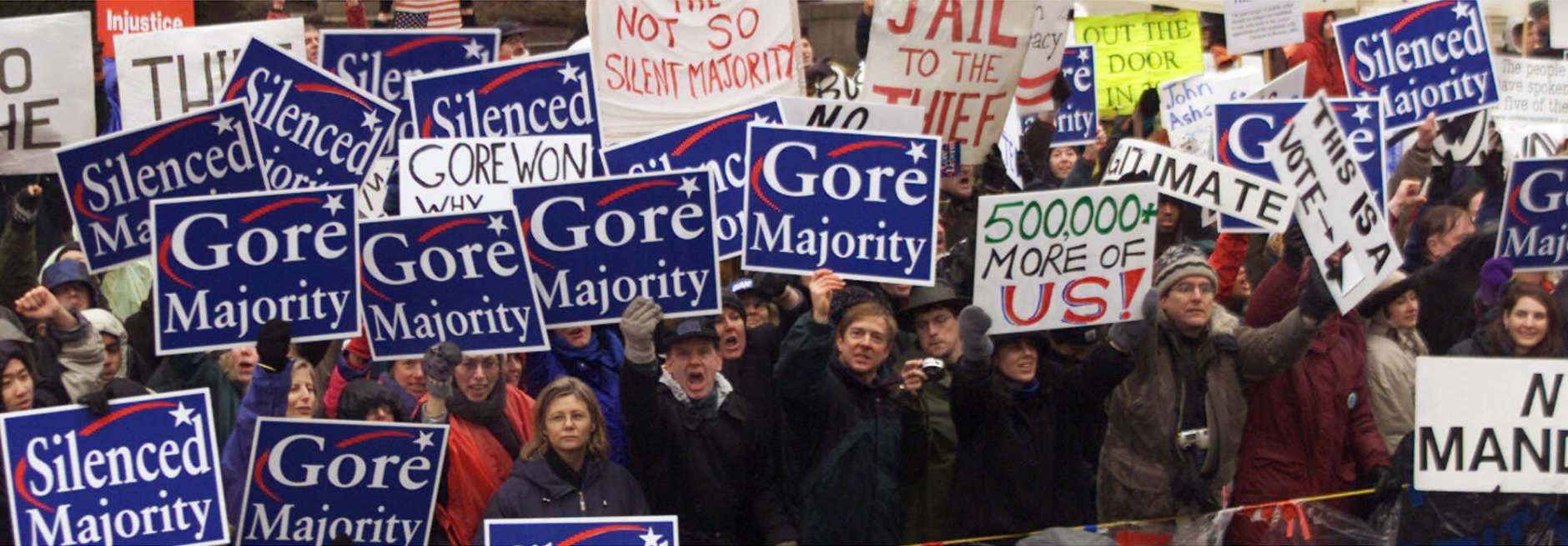 Gore supporters line the parade route along Pennsylvania Avenue in Washington Saturday, Jan. 20, 2001, as the presidential inaugural parade works its way from the Capitol to the White House. (AP Photo/J. Scott Applewhite)