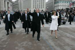 President Bush and first lady Laura Bush walk during the inauguration parade in front of the White House. Thursday, Jan. 20, 2005, in Washington. (AP Photo/Doug Mills/Pool)